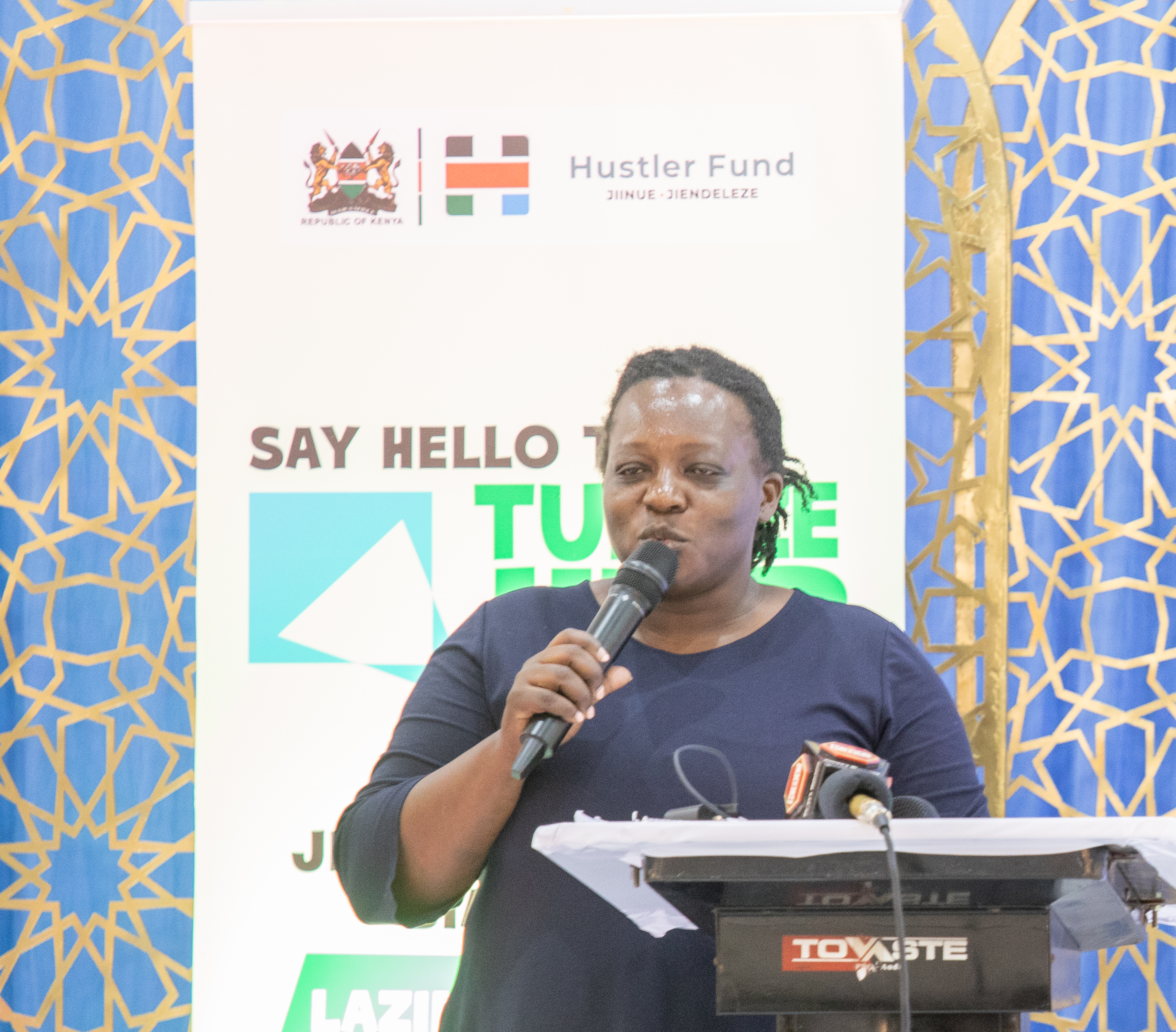 Board Director Edna Atisa giving her remarks
